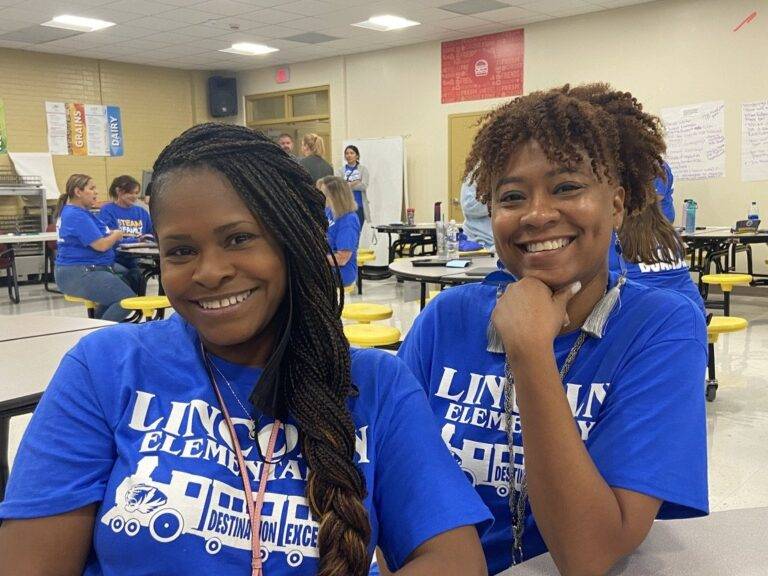 Two Lincoln elementary school teachers posing together